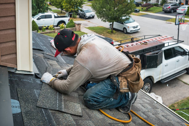 Professional Roof Replacement technician working in Pescadero, CA
